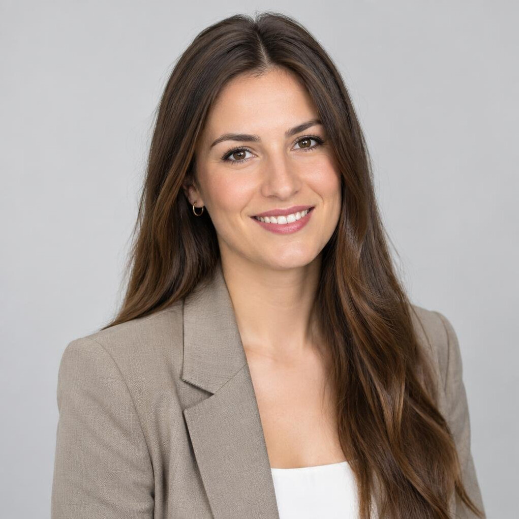 Portrait of a smiling woman in a blazer